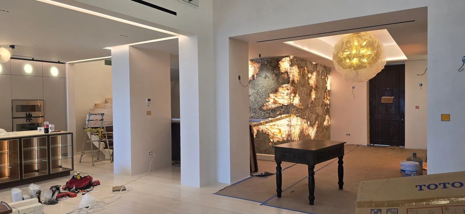 Foyer with a sculptural lamp
