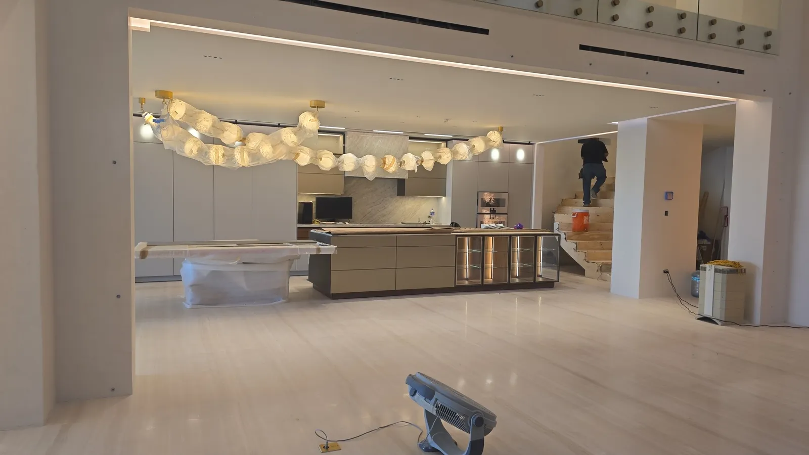 Open living space with suspended fixtures